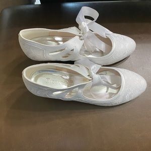 White lacey 1/2 pumps worn once .